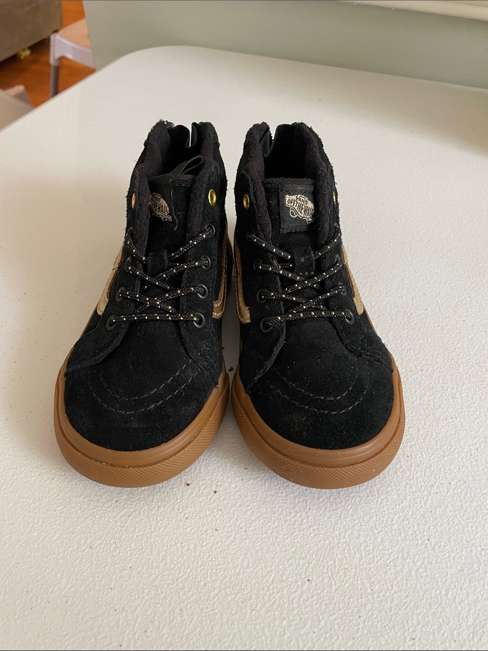 Brown and gold vans